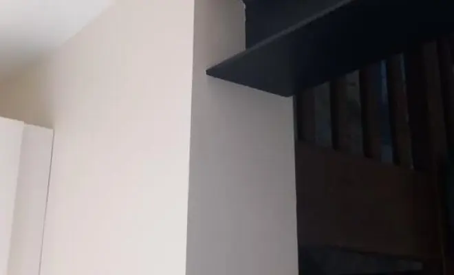 Habillage d'un IPN en plâtrerie et mise en peinture 